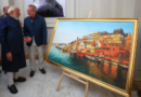 Italian artist Giampaolo Tomassetti presents PM Modi with a painting on Varanasi